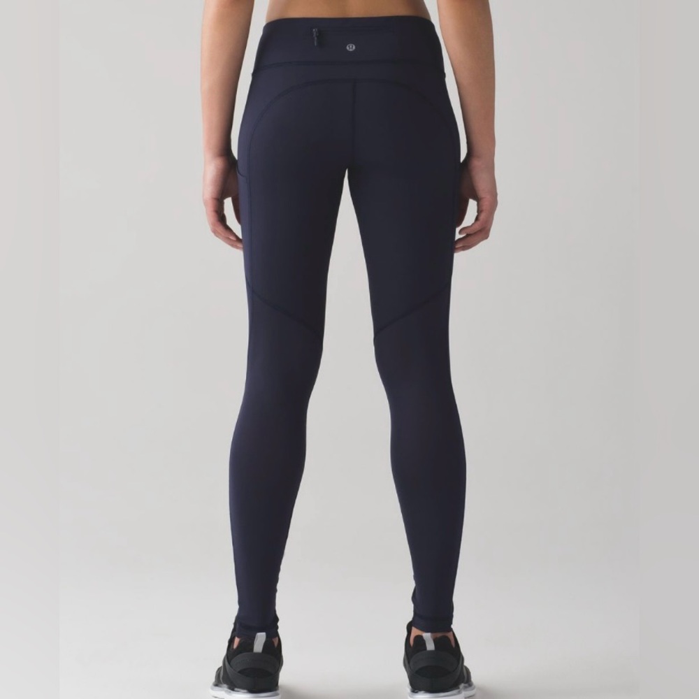 Lululemon speed tights mesh 28” size 4 navy with adjustable reflective ankles